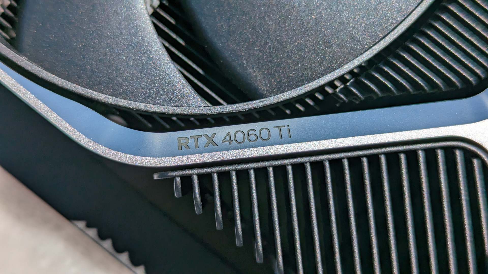 Nvidia GeForce RTX 4060 Ti 8GB review: A top down view of the graphics card, zooming in on its "RTX 4060 Ti" logo