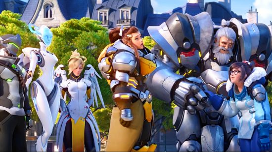 Overwatch 2 PvE - several heroes gather around outdoors to celebrate their victory, shaking their heads after a terrible joke