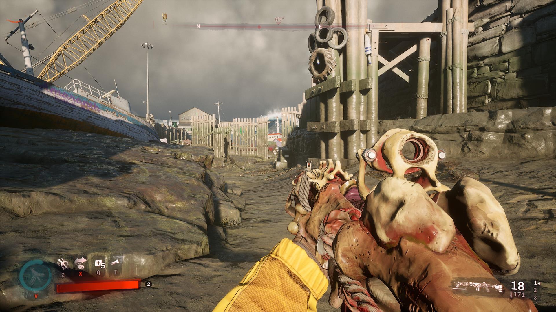 Redfall weapons: a first-person view of character wielding an organic, fleshy assault rifle with a scope.