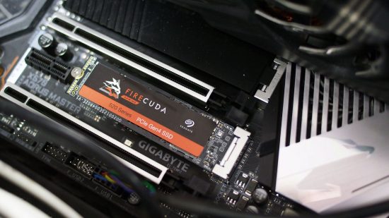Seagate Firecuda 520 SSD in as slot on a motherboard, with a graphics card next to it