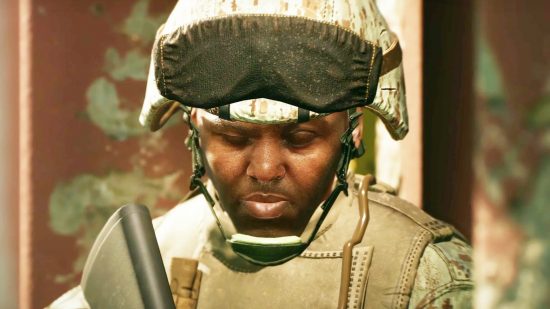 Six Days in Fallujah release date confirmed: A soldier in full military gear hangs his head in FPS game Six Days in Fallujah