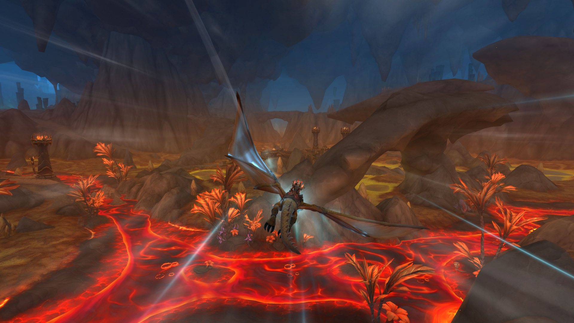 WoW 10.1 interview: a dragon riding over a river of lava.