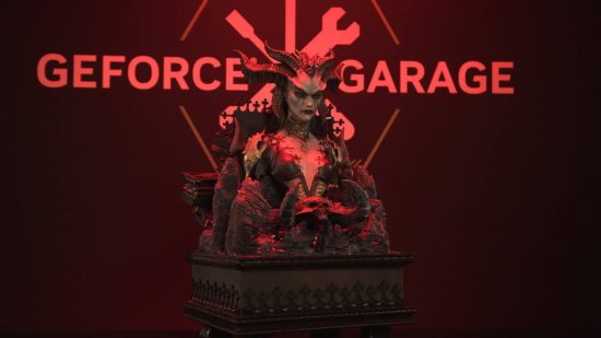 Lilith stands atop a detailed statuette with the words 'GEFORCE GARAGE' in lights on the wall behind.
