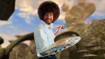 Bob Ross with his large palette of paint standing in front of Morrowind