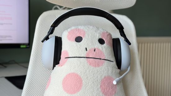 Sony Inzone H9 gaming headset around a cuddly toy