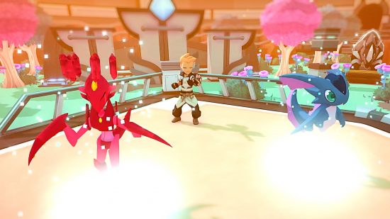 A blonde man stands between one red and one blue monster, using them for a battle