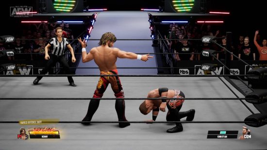 AEW Fight Forever review: Kenny Omega is taunting by pointing at Christian Cage in the middle of the ring, as Christian struggles to get up.