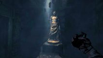 Searching for the Amnesia the Bunker detonator handle will bring you to a large statue under a dim light