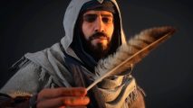 Assassin's Creed Mirage release date: Basim is looking hard at a heron's feather. He is wearing a cowl with a turban underneath.