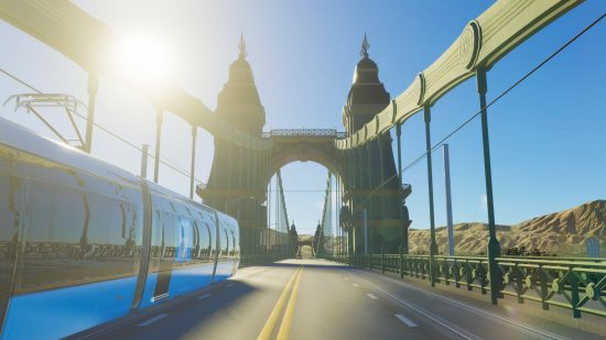 Cities Skylines 2 roundabouts: A train crosses a bridge on a bright sunny day in city-building game Cities Skylines 2