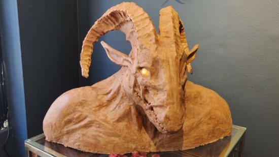 Diablo 4 chocolate shop - a chocolate model of a beefy, horned Khazra goatman, left unfinished to show the modeling process.
