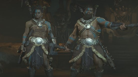 Two Diablo 4 Barbarians stand side by side in Maugan's Works.
