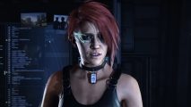 A woman with a punk haircut and sci fi visor stands center screen with her mouth slightly open.