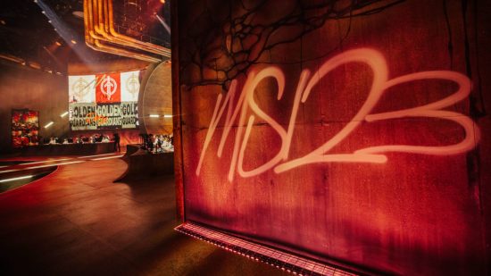A photo of a red wall with MSI 23 written on it with white graffiti 