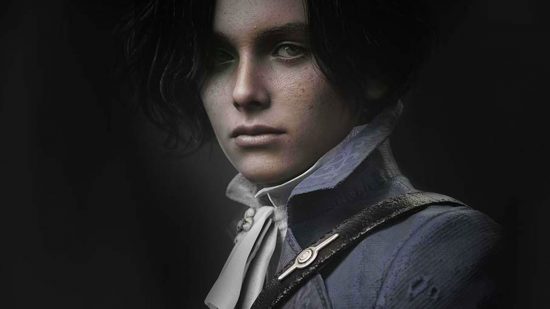 A young boy with curly black hair that falls over his eyes looks into the camera wearing a blue ripped coat and a white Victorian ruffled shirt