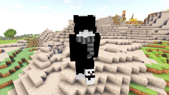 Best Minecraft skins: A young-looking player avatar wears a mostly black emo skin, with a long fringe covering their eyes, in front of a gravelly hills backdrop.