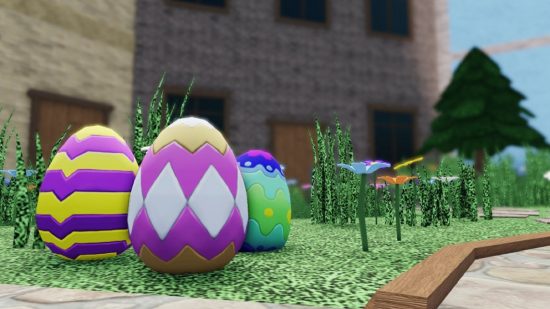 一些復活節彩蛋坐在一塊草地上。