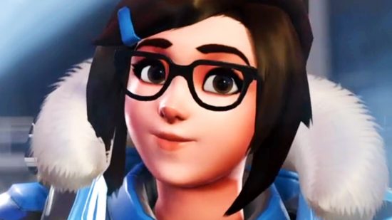 Overwatch 2 tar tillbaka publikkontrollen - Mei, en glad ung kvinna i harge glasögon och päls -krage jacka, leenden mot kameran