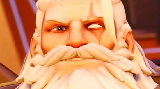 Overwatch 2 Flashpoint maps - Reinhardt gives a warm smile through his large, white beard.