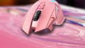An image of the peach pink G502 lightspeed wireless mouse from Logitech.