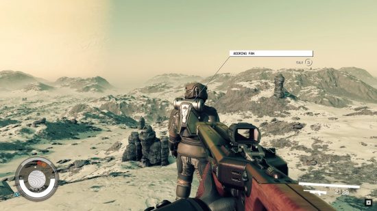 The player levels his gun at the Starfield Adoring Fan while his back is turned, too preoccupied with taking in the landscape to notice the threat.