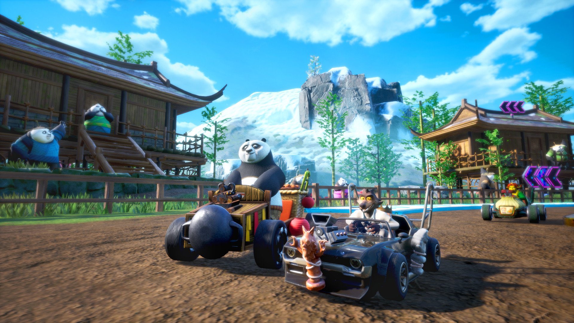 Kung Fu Panda characters race side-by-side in go-karts down a dirt path