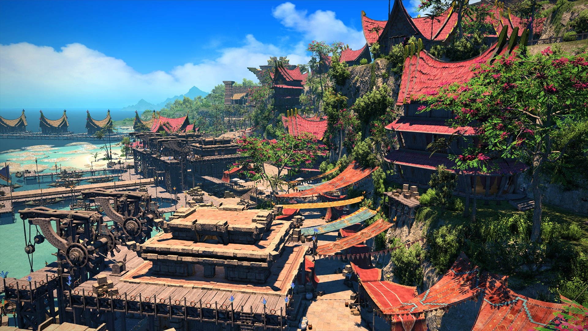 A new area from FFXIV featuring buildings among forest trees and a blue, cloudy sky