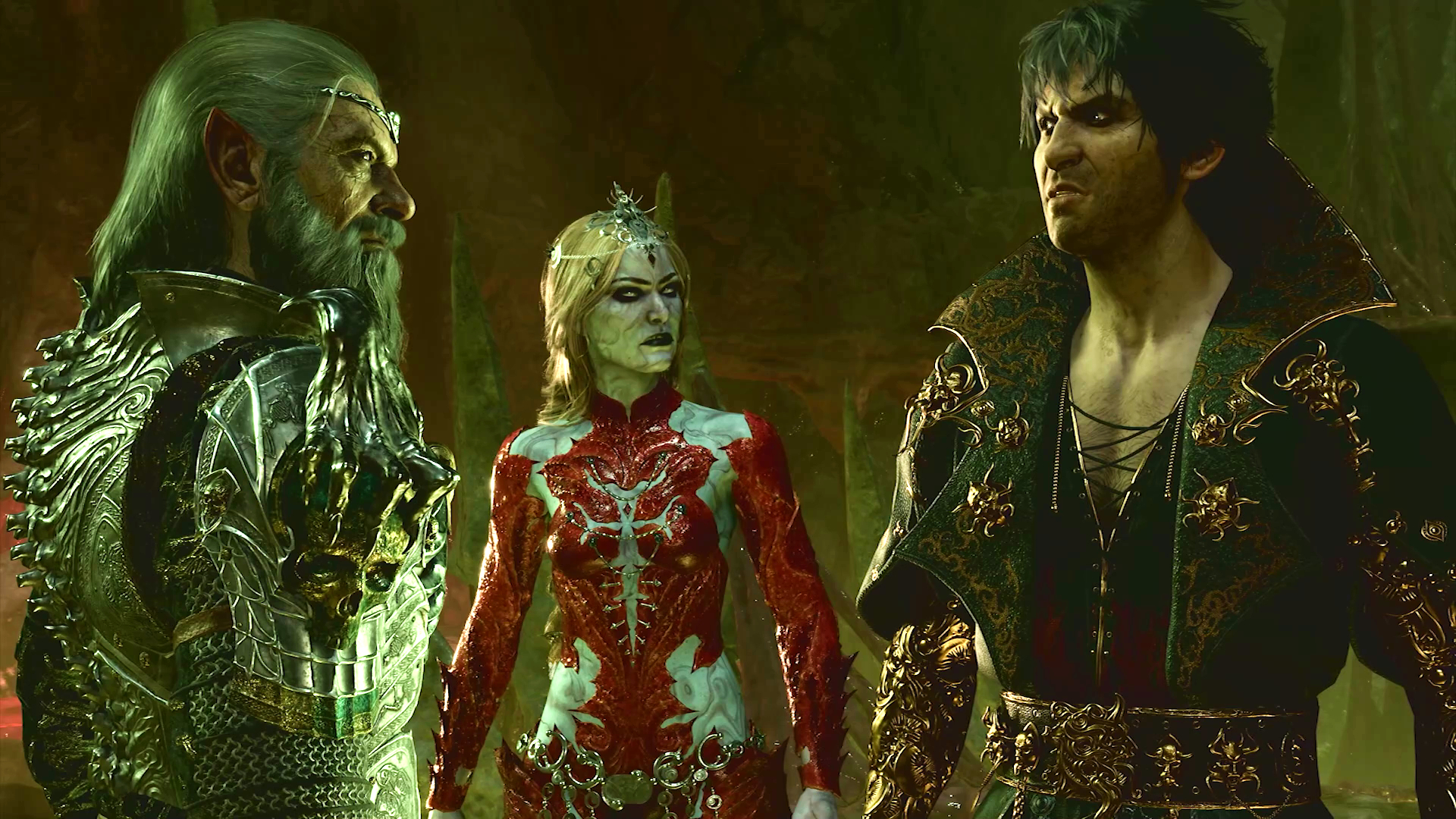 A blonde woman wearing a red and silver dress stands between one older, bearded man and a younger man