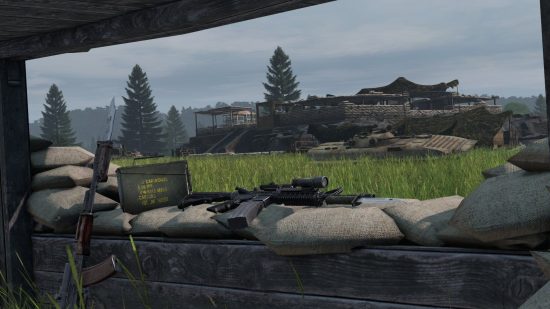 best dayz servers: an AK47 and a sniper rifle lay on a makeshift barricade on a grassy field overlooking a building