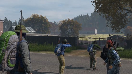 best dayz servers: five soldiers with rifles on their backs behind the gates of an empty farm field