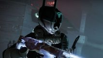 Some Destiny 2 mods are disabled after ridiculous exploit surfaces: An image of a Guardian holding a weapon in a dark setting.