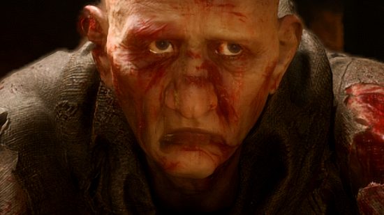 Diablo 4 memory leak fix - a sad-looking man, his face dishevelled and bloodied.