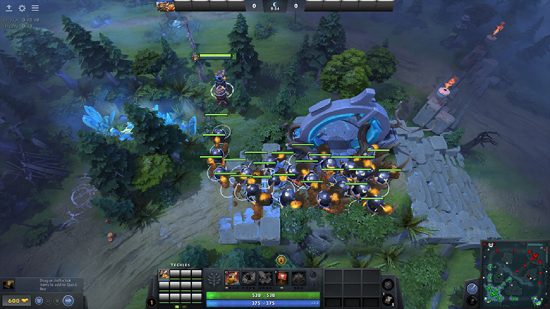 Dota 2 - a group of controllable Sticky Bombs stand around one of the MOBA's Twin Gates.