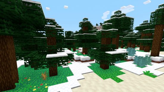Snow topped spruce trees stand atop bright green grass with colorful flowers embedded within the surface in the Bloom Minecraft texture pack.