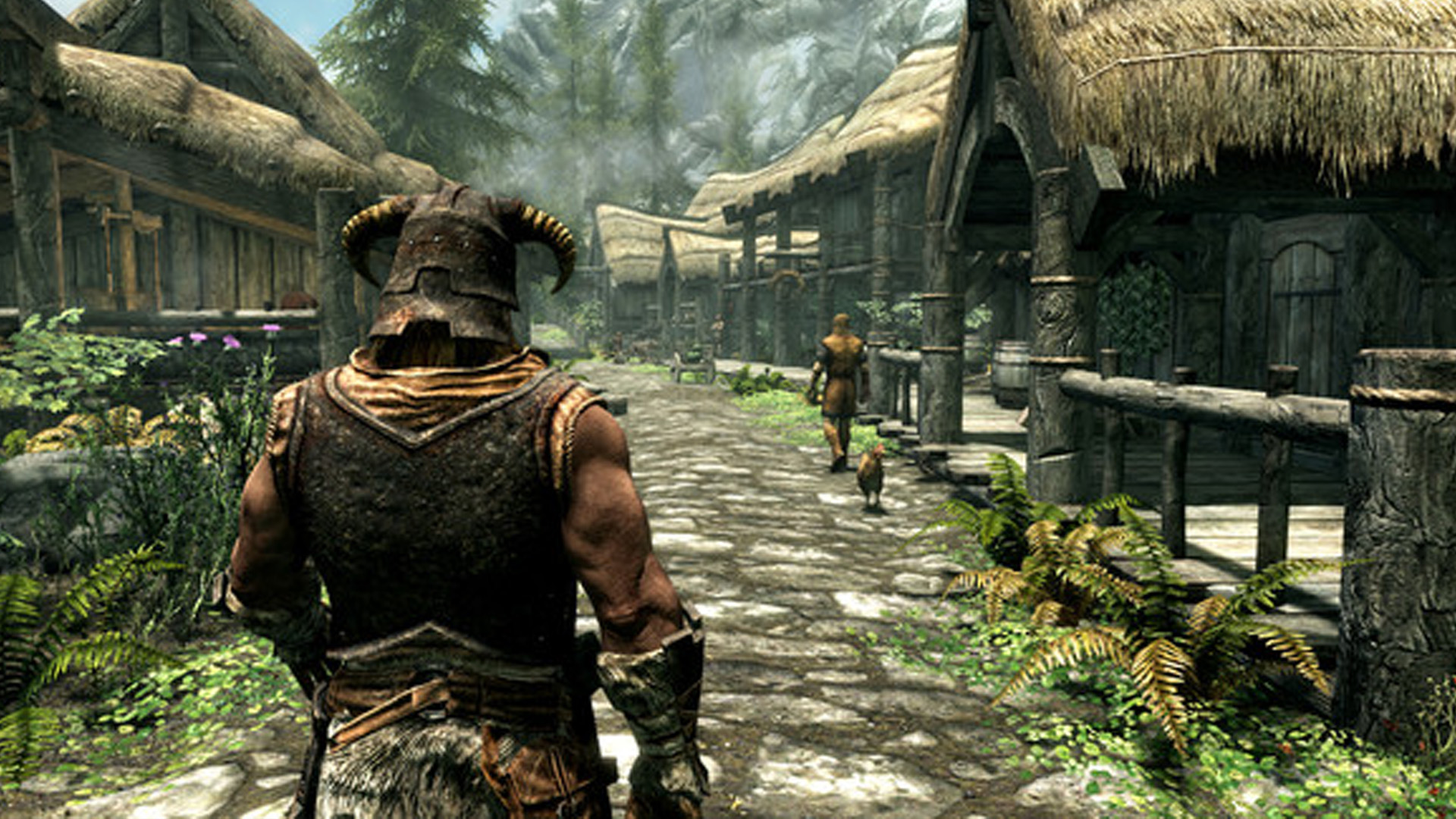 An image of the player character walking in a town in The Elder Scrolls V: Skyrim Special Edition.