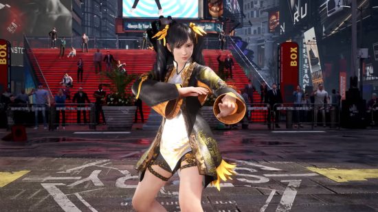 Tekken 8 tier list: Xiaoyu, dressed in a short black and gold Chinese dress, is preparing to fight in Time Square.