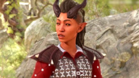 A Tiefling character from Baldur's Gate 3 with red skin and dark horns looks to her side