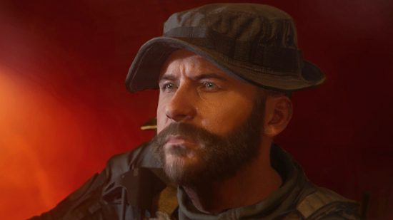 Tanggal rilis MW3: Kapten Harga dari Modern Warfare 3, melihat ke kejauhan, latar belakang merah yang mengancam di belakangnya