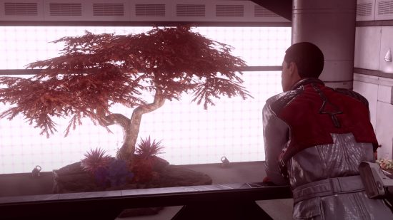 Starfield Ryujin Industries member is pictured looking over a balcony in the faction's headquarters
