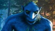 A giant with green eyes from Valheim smiles