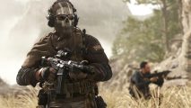 Call of Duty Modern Warfare II: A Soldier, Ghost, in a field with a gun.