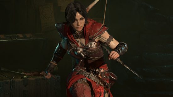 Interest in Diablo 4 has dropped to less than 2%, and it hurts me: A woman with black bobbed hair wearing red leather armor with a bow on her back runs towards the camera in a dark cellar area