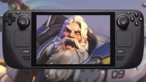 Reinhardt, from Overwatch 2, lets out a mighty shout as his face appears on a Steam Deck