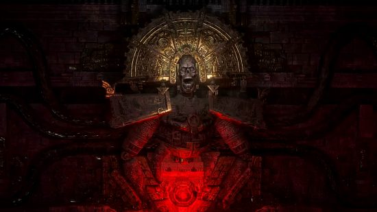 Path of Exile 2 release date - a living statue in a wal with a large golden crest atop its head clutches a glowing red crystal.