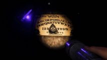 Phasmophobia update Ascension patch notes - A player looks at a Ouija Board.