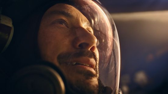 The best space games: Starfield Barrett looks out into the atmosphere with a reflection shining off his space suit helmet