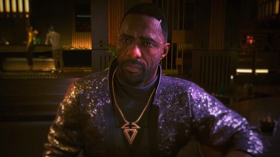 Cyberpunk 2077 autosave issues: Idris Elba as Solomon Reed in Phantom Liberty wearing a sparkly dark suit and long golden necklace