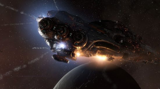 Best free PC games: an Eve Online spaceship is surrounded by a yellow glow and a galaxy environment