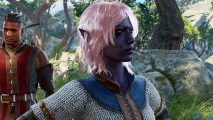 An elf character with rose gold hair and dark purple skin wearing chainmail armor stands in a forest frowning