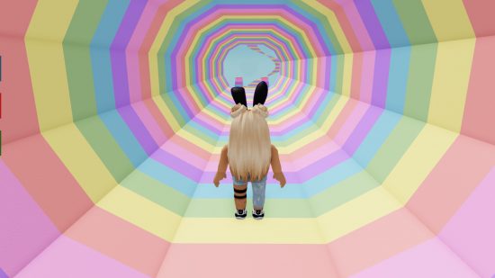 A blonde-haired Roblox avatar stands in a pastel colored tube in one of the best Roblox games: Cotton Obby.